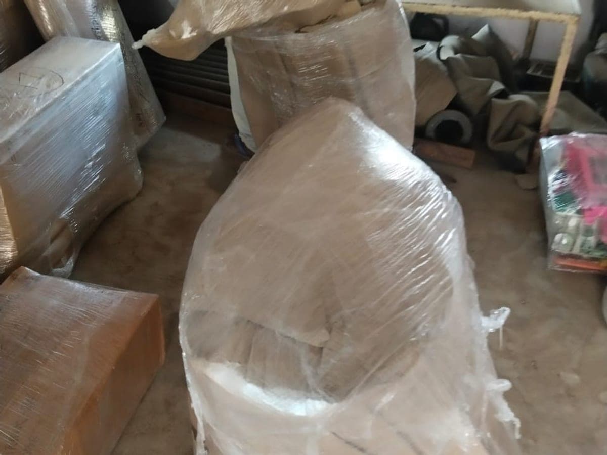 An armchair wrapped in stretch film